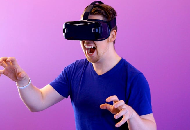 Man playing with VR headset on